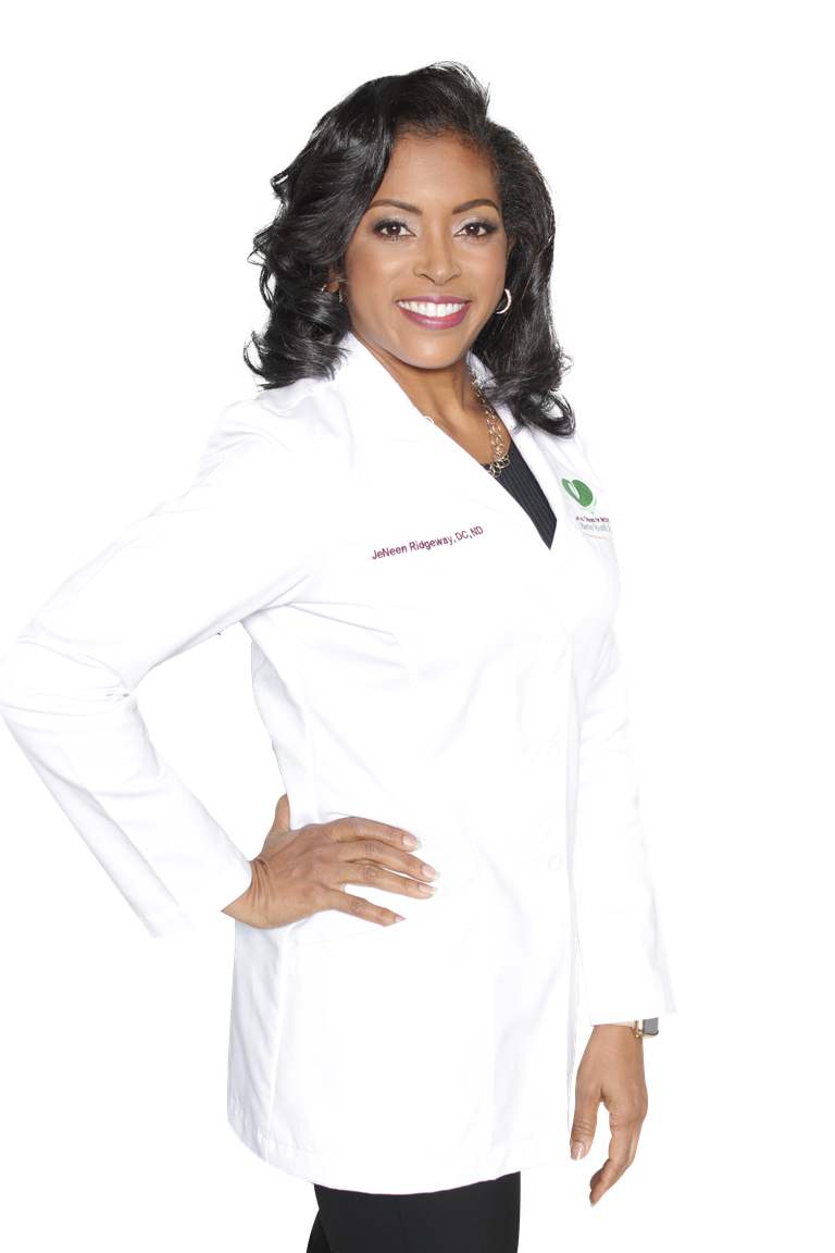 Dr JeNeen Ridgeway in white coat